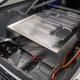 View of the battery pack inside the trunk, extending in place of the rear seats in the AE86 EV Concept.